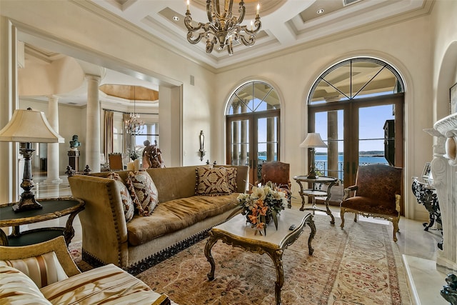 living room featuring coffered ceiling, a notable chandelier, light tile floors, french doors, and ornate columns