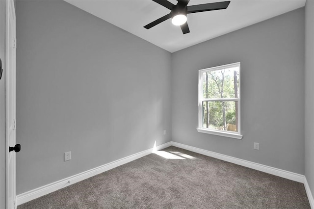 carpeted empty room with ceiling fan