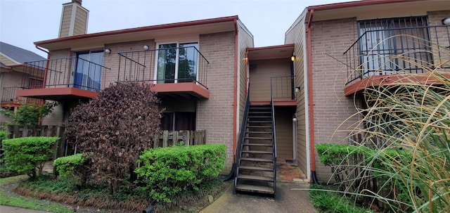 view of building exterior with stairway