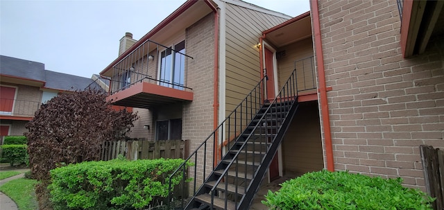 view of property featuring stairs