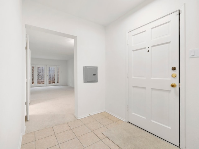 foyer entrance with light tile floors