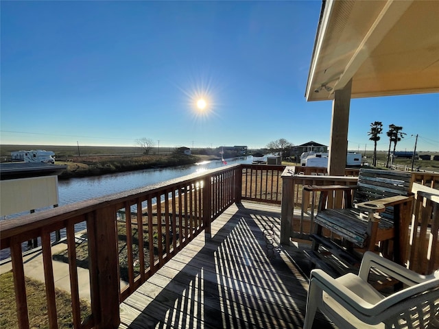 deck featuring a water view