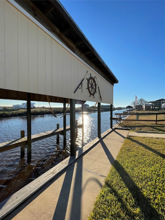 dock area with a water view