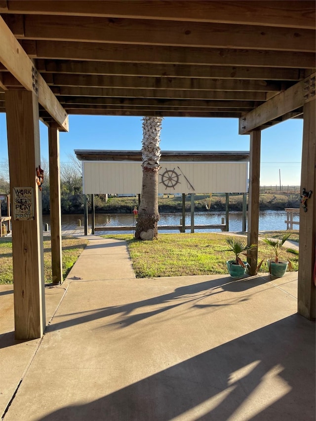 239 Heron St Unit Cr299, Sargent, TX 77414 - view of patio with a water view