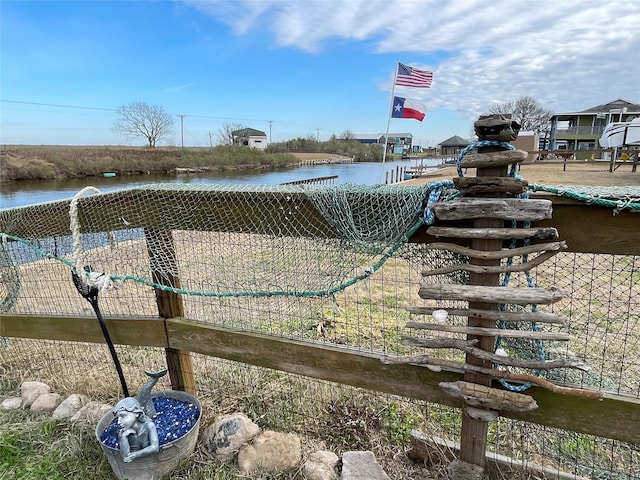239 Heron St Unit Cr299, Sargent, TX 77414 - dock with fence and a water view