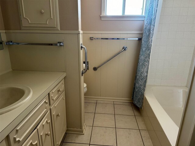713 Sarah Jo St, La Grange, TX 78945 - full bath with tile patterned flooring, vanity, shower / tub combo, and toilet
