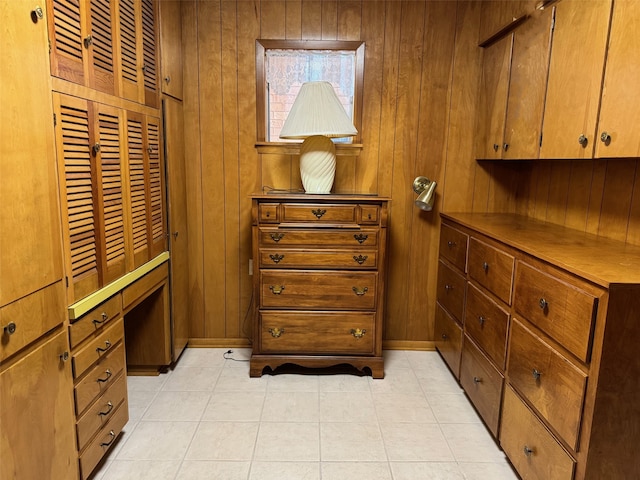 walk in closet featuring light tile patterned floors