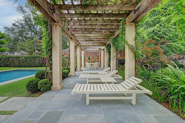 view of patio featuring a pergola