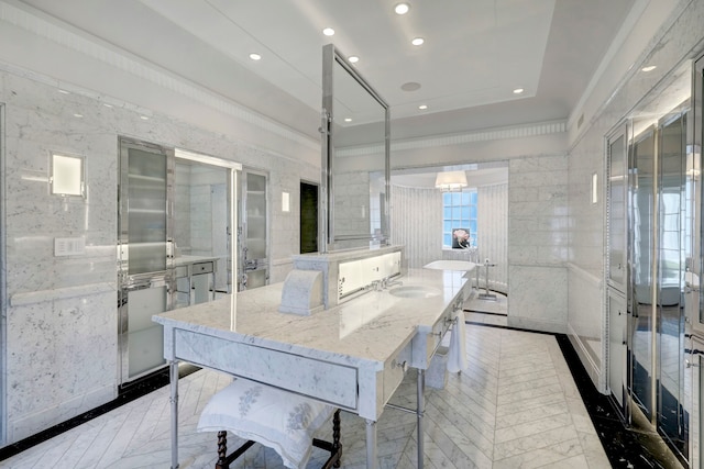 bathroom with tile walls, double vanity, and tile flooring