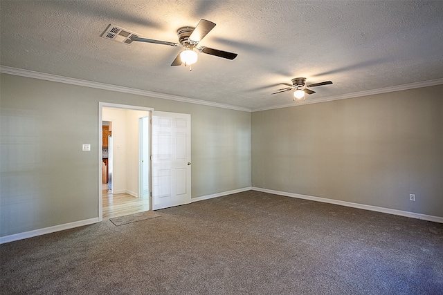 carpeted empty room with ceiling fan, a textured ceiling, and crown molding