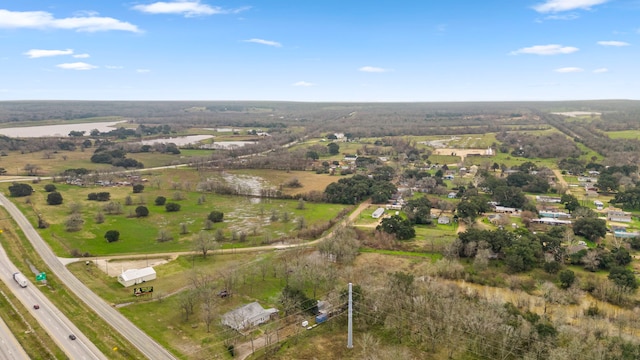 birds eye view of property featuring a rural view