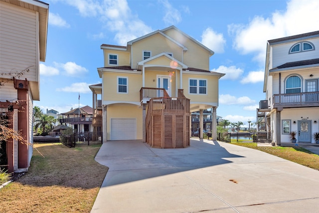 view of front of property with a balcony and a garage