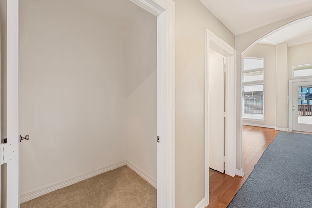 hall with light hardwood / wood-style flooring