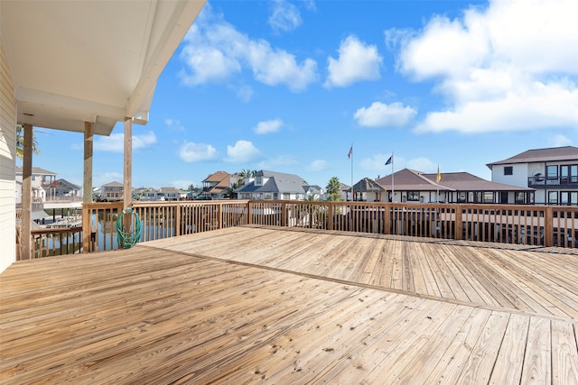 wooden deck with a water view