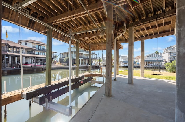 dock area with a water view