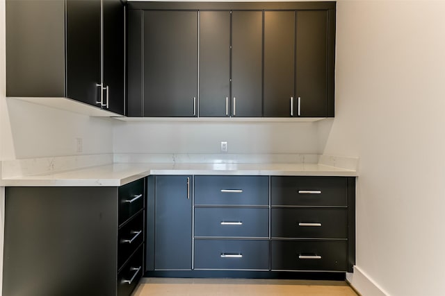 kitchen with light stone countertops