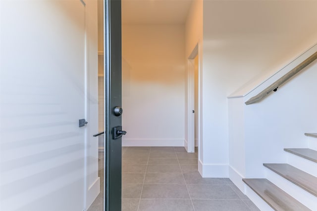 interior space with tile patterned floors