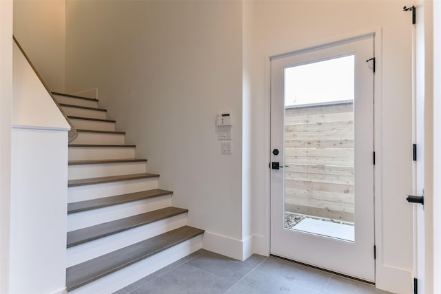 entryway featuring light tile patterned floors