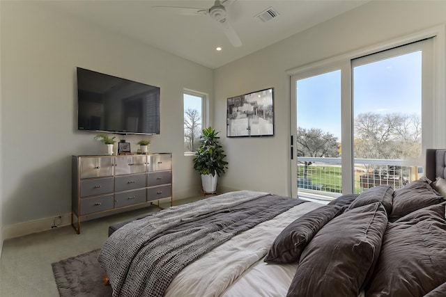 bedroom with light colored carpet and ceiling fan