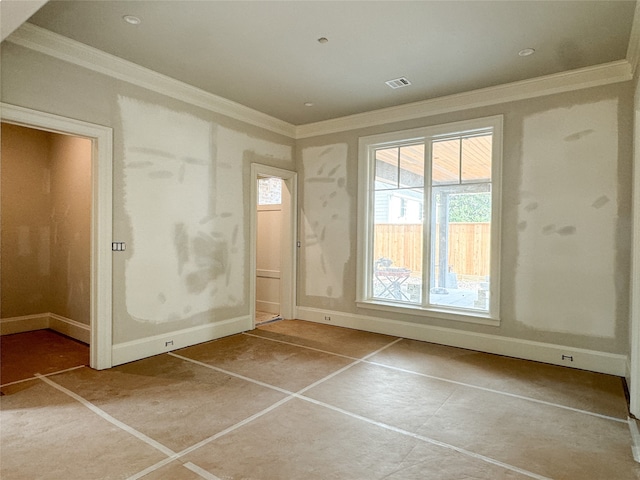 interior space with ornamental molding and light tile patterned flooring