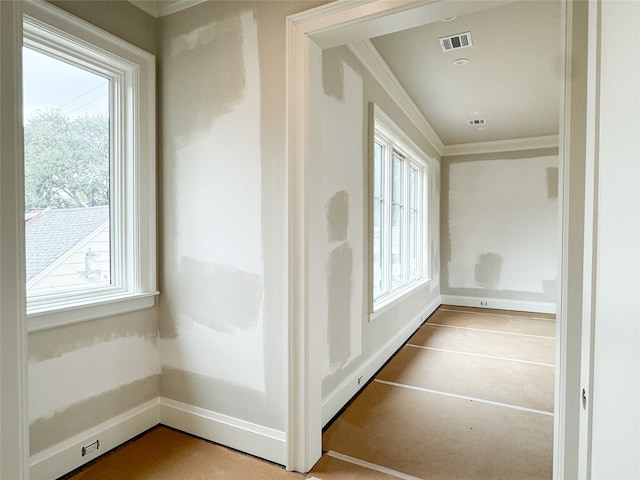 hallway with crown molding