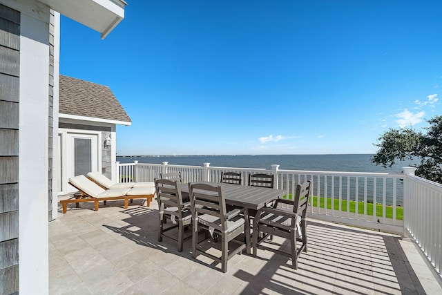 view of patio / terrace with a water view