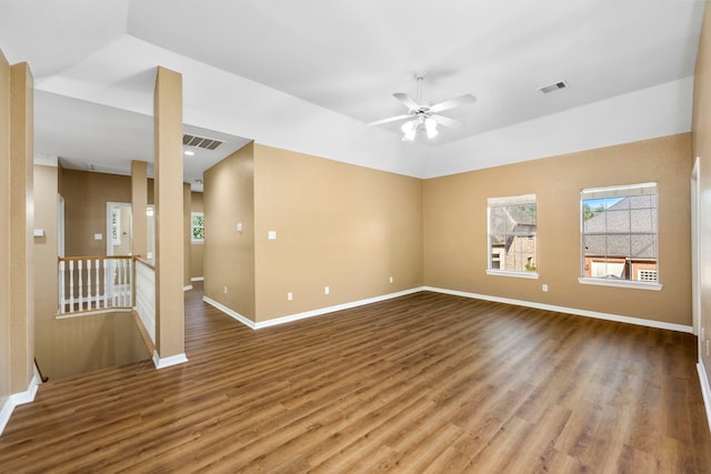 empty room featuring dark hardwood / wood-style floors and ceiling fan