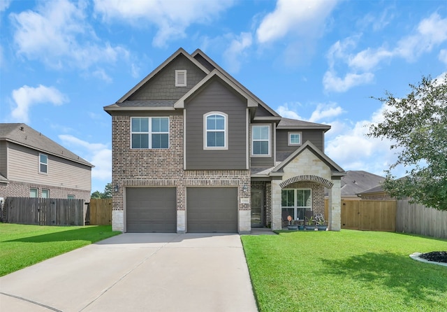 view of front of home featuring a front yard and a garage