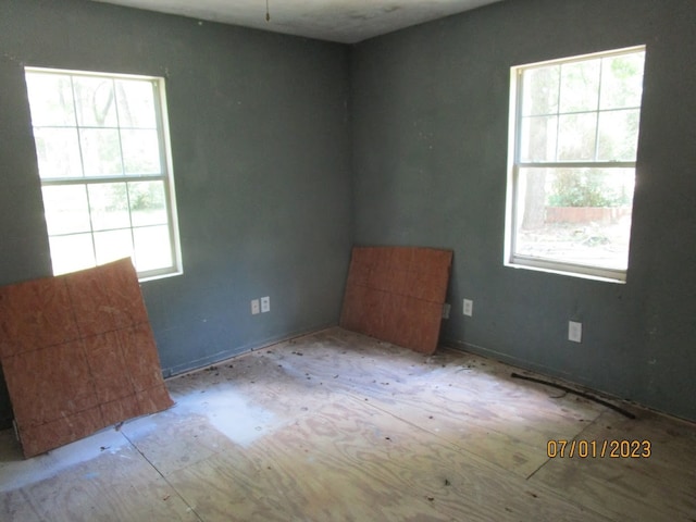 spare room with a wealth of natural light