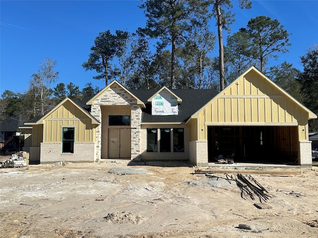 property in mid-construction featuring a garage