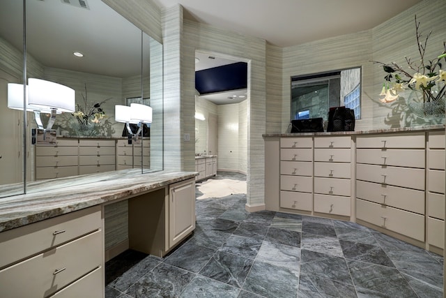 bathroom with tile walls and tile flooring