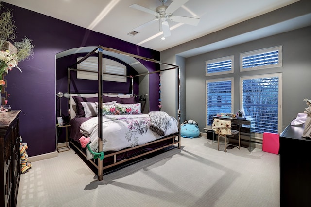 bedroom featuring ceiling fan and light colored carpet