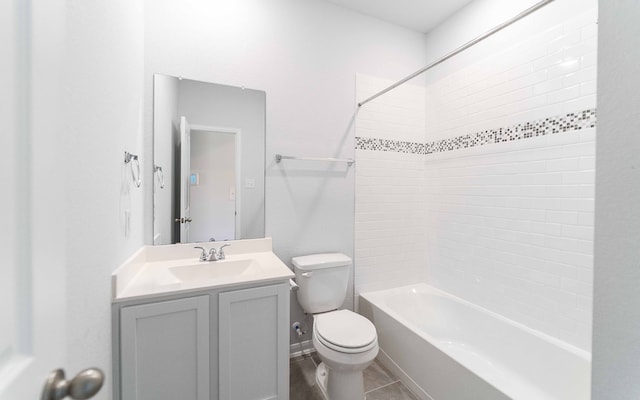 full bathroom with vanity, toilet, tile patterned floors, and tiled shower / bath