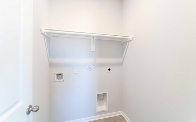 laundry area with hookup for a washing machine, electric dryer hookup, tile patterned floors, and gas dryer hookup