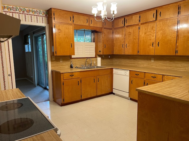 kitchen with white dishwasher, an inviting chandelier, backsplash, sink, and light colored carpet