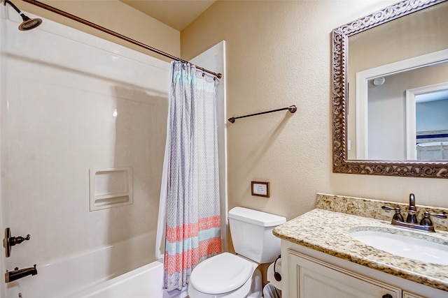 full bathroom featuring toilet, shower / bathtub combination with curtain, and vanity