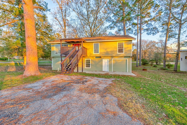 exterior space featuring a deck and a garage