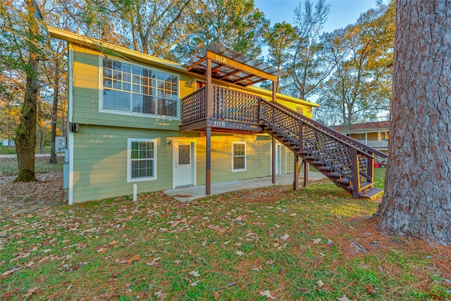 rear view of house featuring a patio area