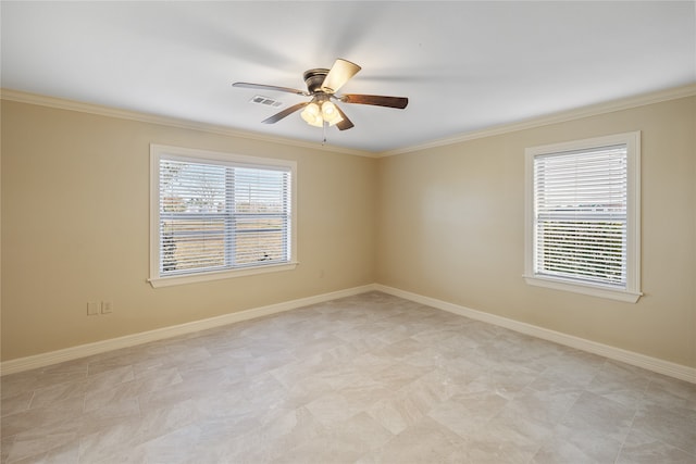 tiled spare room featuring ceiling fan and ornamental molding