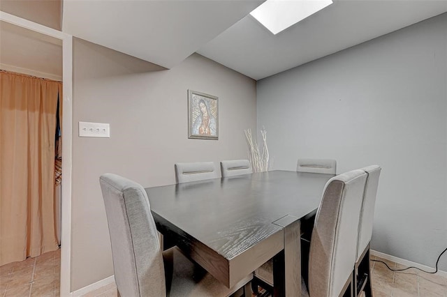 dining room with light tile floors