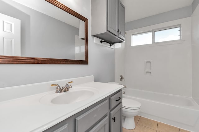 full bathroom with tub / shower combination, tile flooring, toilet, and vanity