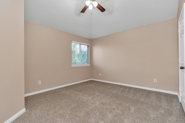 spare room with light carpet and ceiling fan