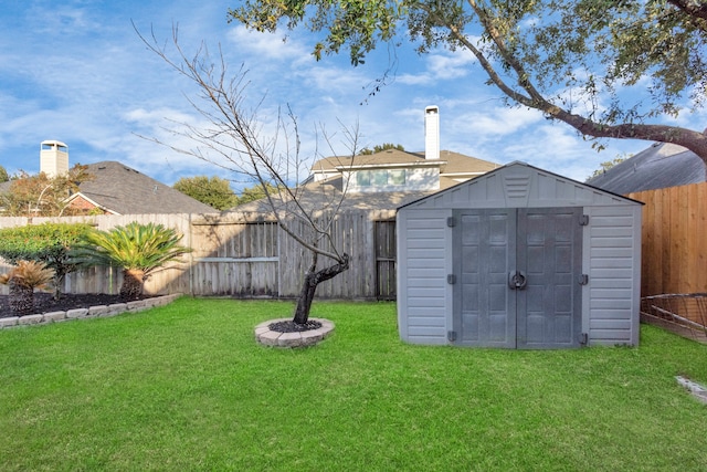 view of shed / structure with a yard