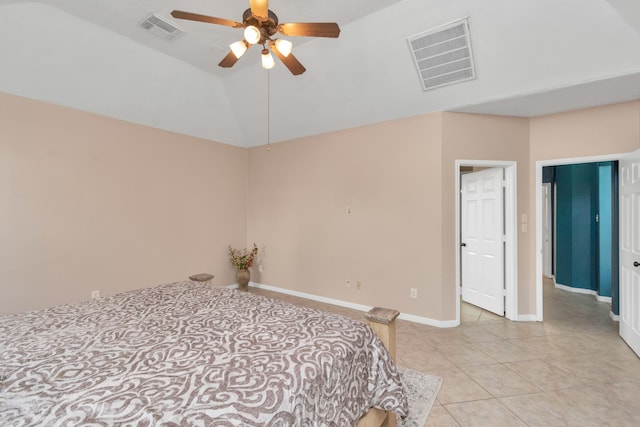 bedroom featuring vaulted ceiling, ceiling fan, and light tile flooring