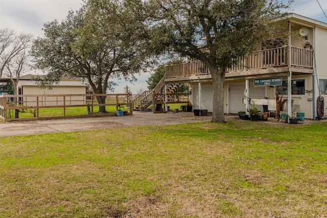 view of yard with a garage