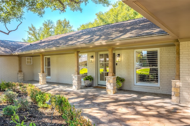 doorway to property with a patio