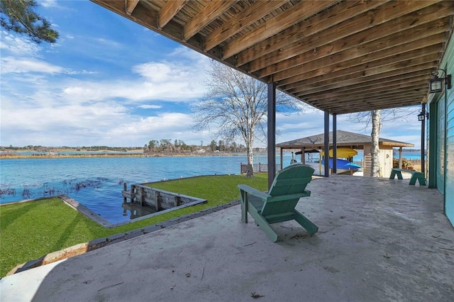 view of patio featuring a water view