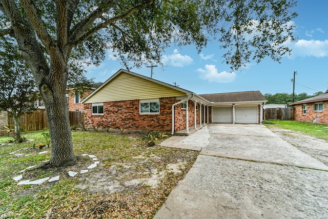 single story home with a garage