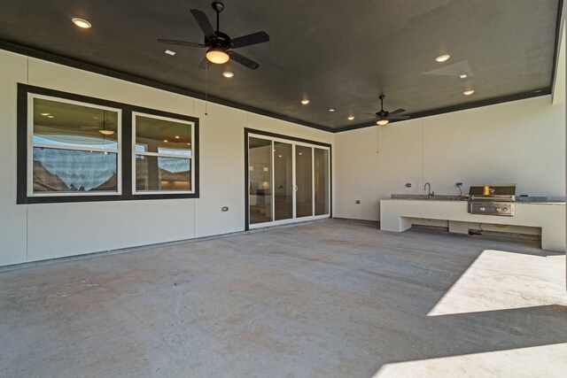 view of patio / terrace featuring a grill and ceiling fan