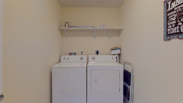 laundry room featuring hookup for a washing machine, washer and clothes dryer, and electric dryer hookup